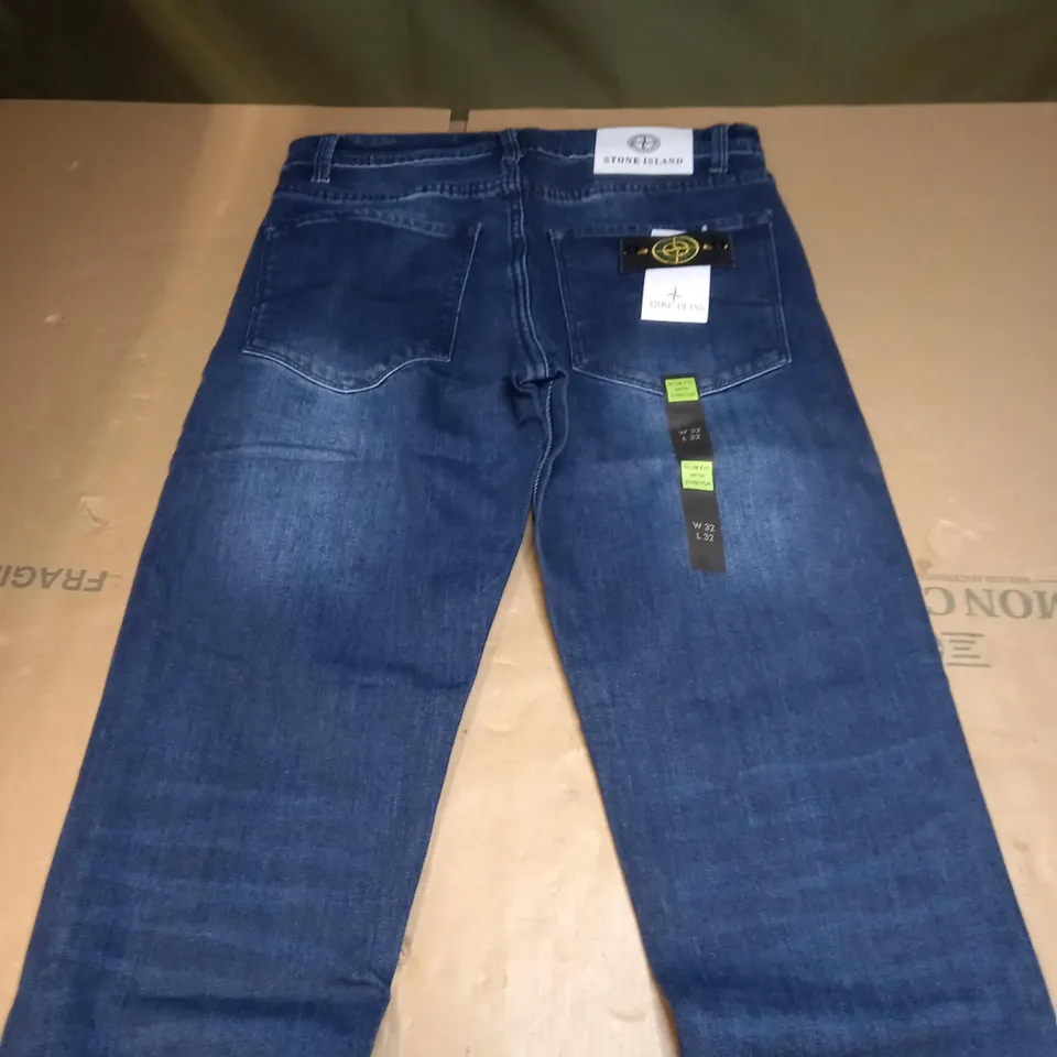 PAIR OF STONE ISLAND DENIM JEANS SIZE W 32