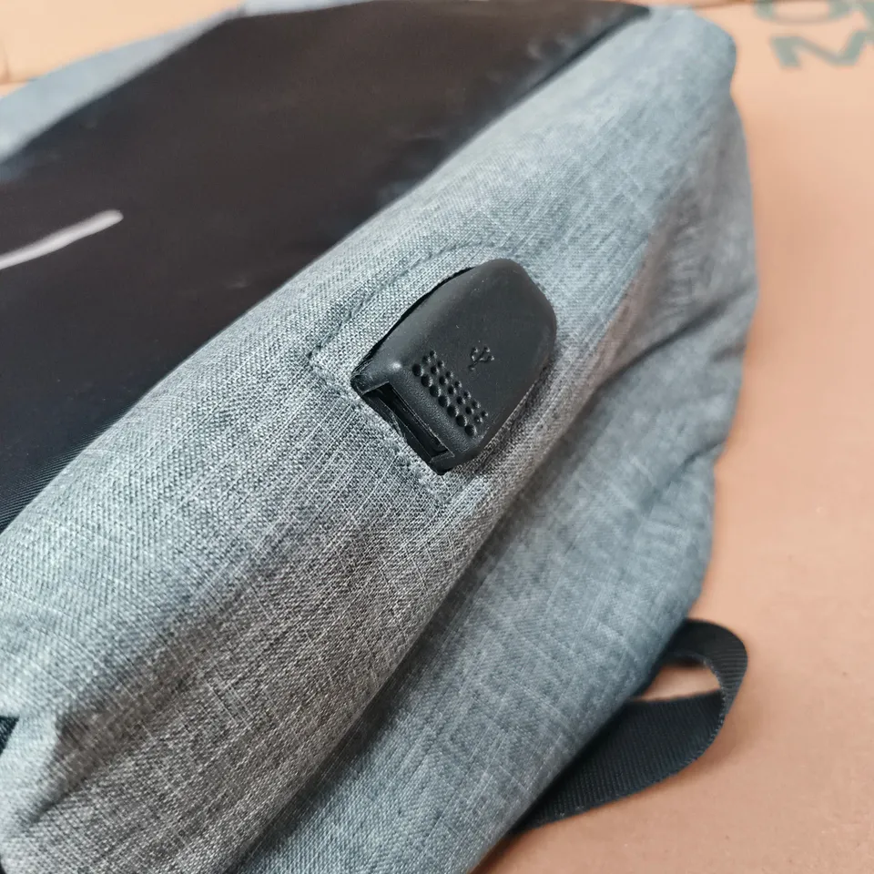 GREY BACKPACK WITH USB PORT AND REFLECTIVE STRIPE
