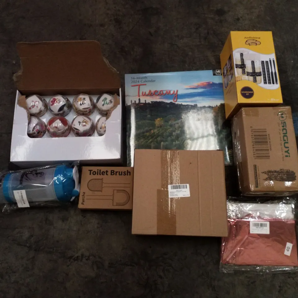PALLET OF 6 BOXES CONTAINING ASSORTED PRODUCTS INCLUDING BIRTHDAY DECORATIONS, TOILET BRUSH, TUSCANY 2024 CALENDAR, SOURDOUGH KIT, SURPRISE EGG TOY, ARMREST STORAGE BOX