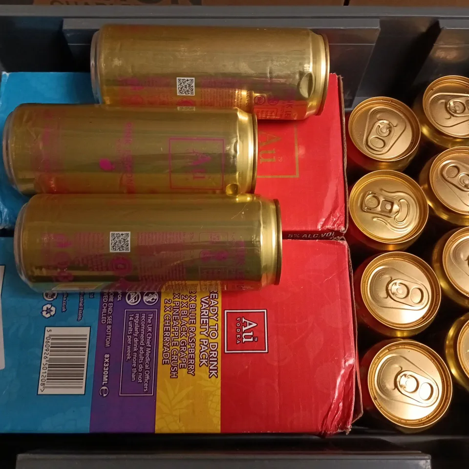 APPROXIMATELY 26 CANS OF AU VODKA TO INCLUDE FLAVOURS SUCH AS PINK LEMONADE, BLUE RASPBERRY, BLACK GRAPE, ETC - COLLECTION ONLY