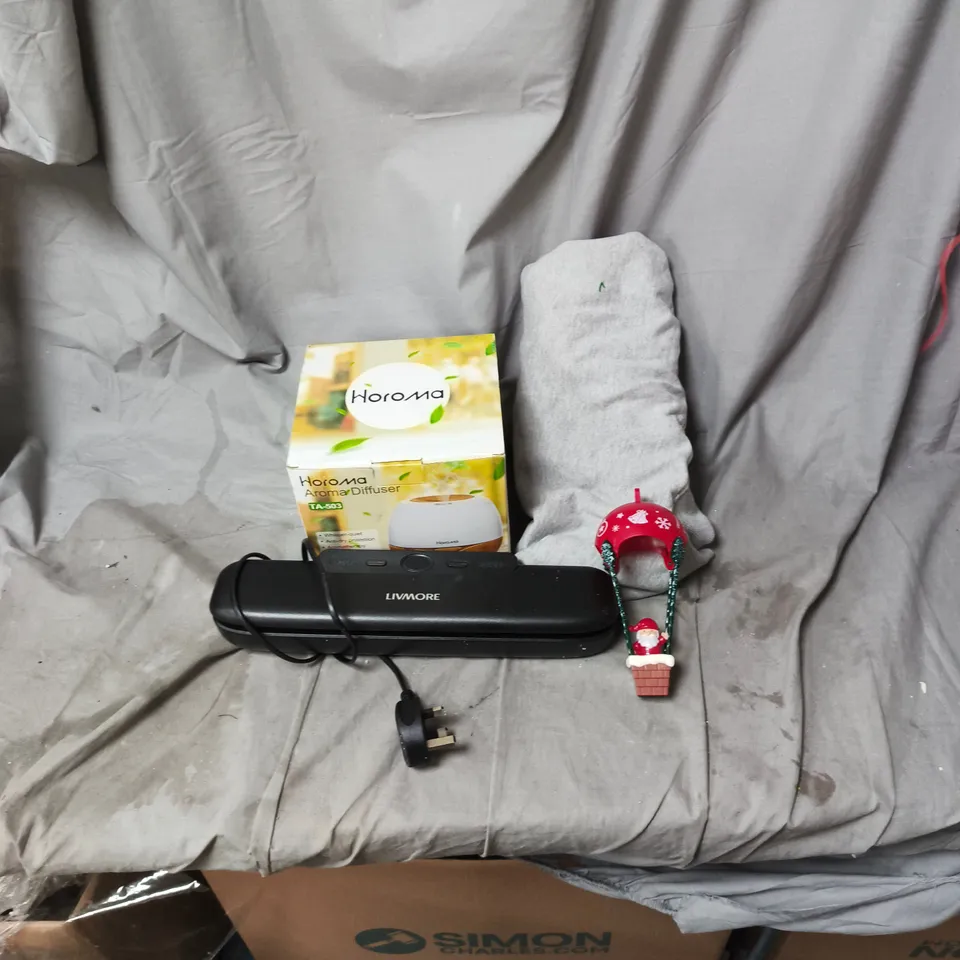 BOX OF APPROXIMATELY 20 ASSORTED ITEMS INCLUDING LIVMORE VACUUM SEALER, XMAS DECORATION, GREY SMALL JUMPER, AROME DIFFUSER ETC