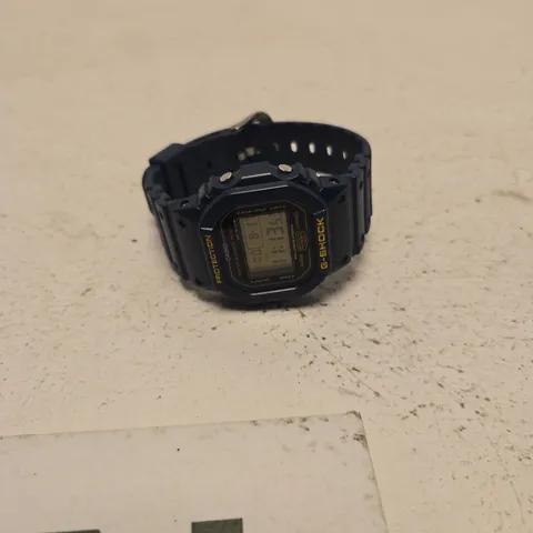 CASIO G-SHOCK DIGITAL WATCH WITH HEXAGONAL TIN BOX