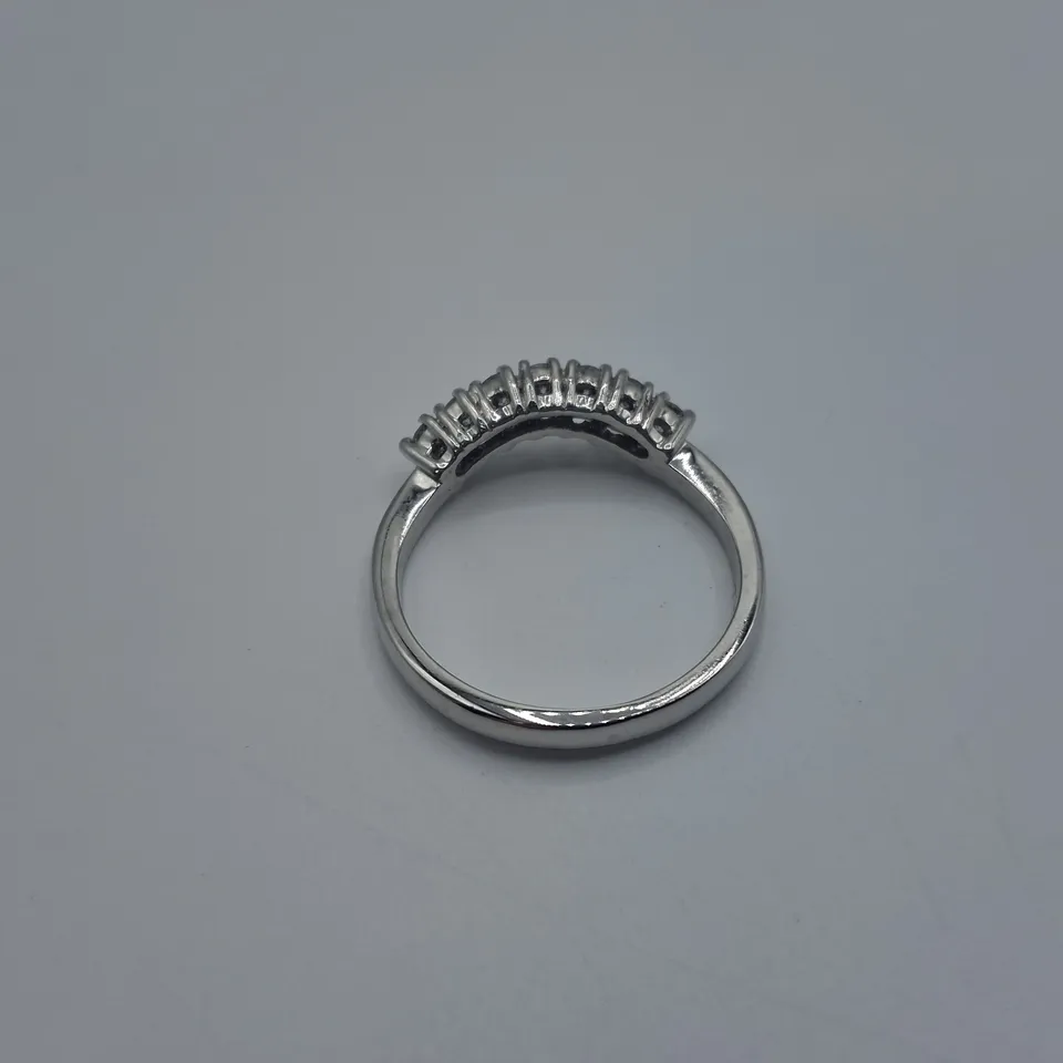 PLATINUM SEVEN STONE CURVED HALF ETERNITY RING SET WITH NATURAL DIAMONDS