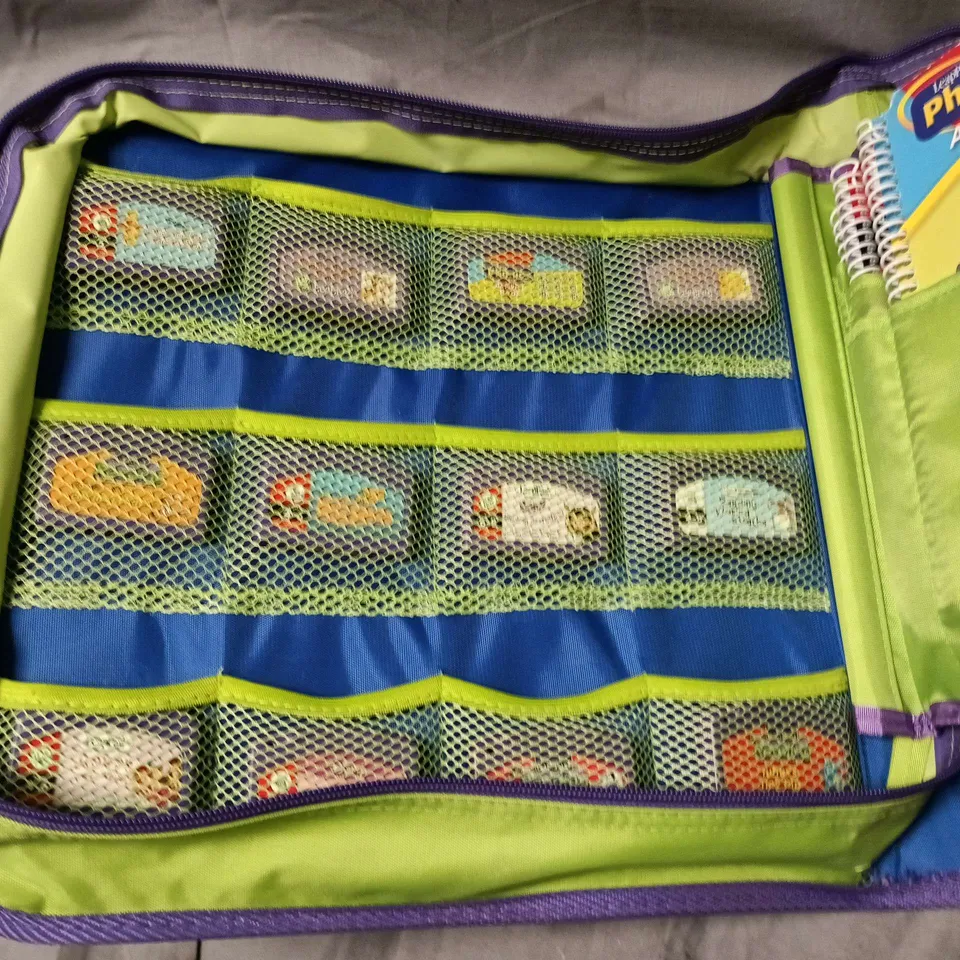 LEAP FROG LEARNING SYSTEM IN BINDER WITH BOOKS AND 12 GAMES