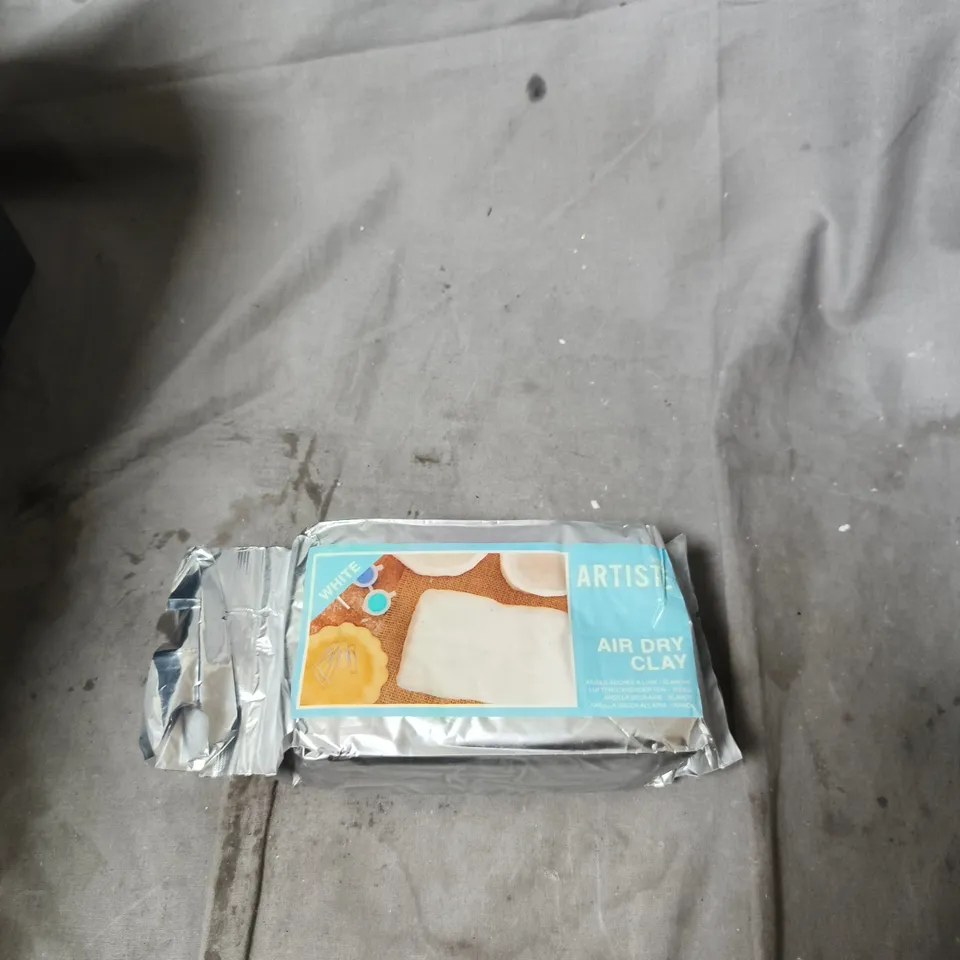 APPROXIMATELY 12 ASSORTED ITEMS INCLUDING TENNIS BALLS , EMBOSSING SEAL AND ARTISTS AIR DRY CLAY 