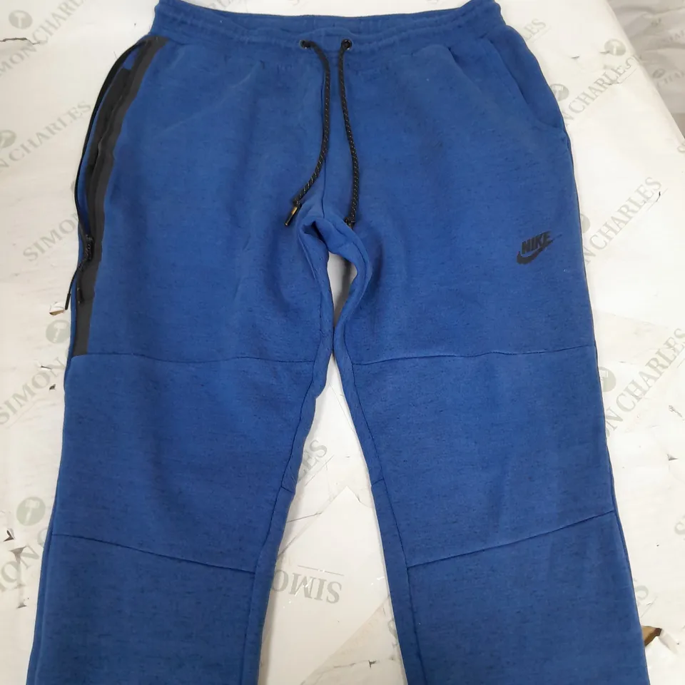 NIKE BLUE TRACKSUIT PANTS - LARGE