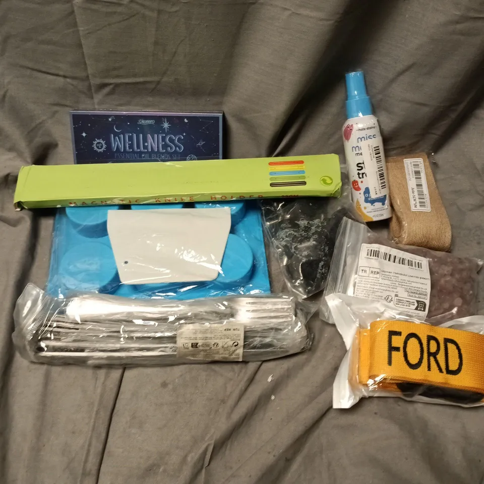 APPROXIMATELY 12 ASSORTED HOUSEHOLD ITEMS TO INCLUDE ESSENTIALS OILS BLENDS SET, CUTLERY, STAIN REMOVER, ETC