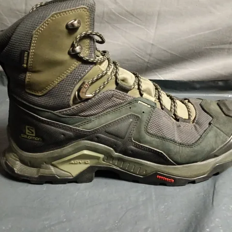 PAIR OF SALOMON HIKING BOOTS –UK SIZE UNSPECIFIED