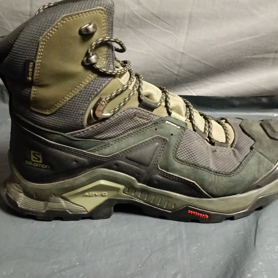 PAIR OF SALOMON HIKING BOOTS –UK SIZE UNSPECIFIED