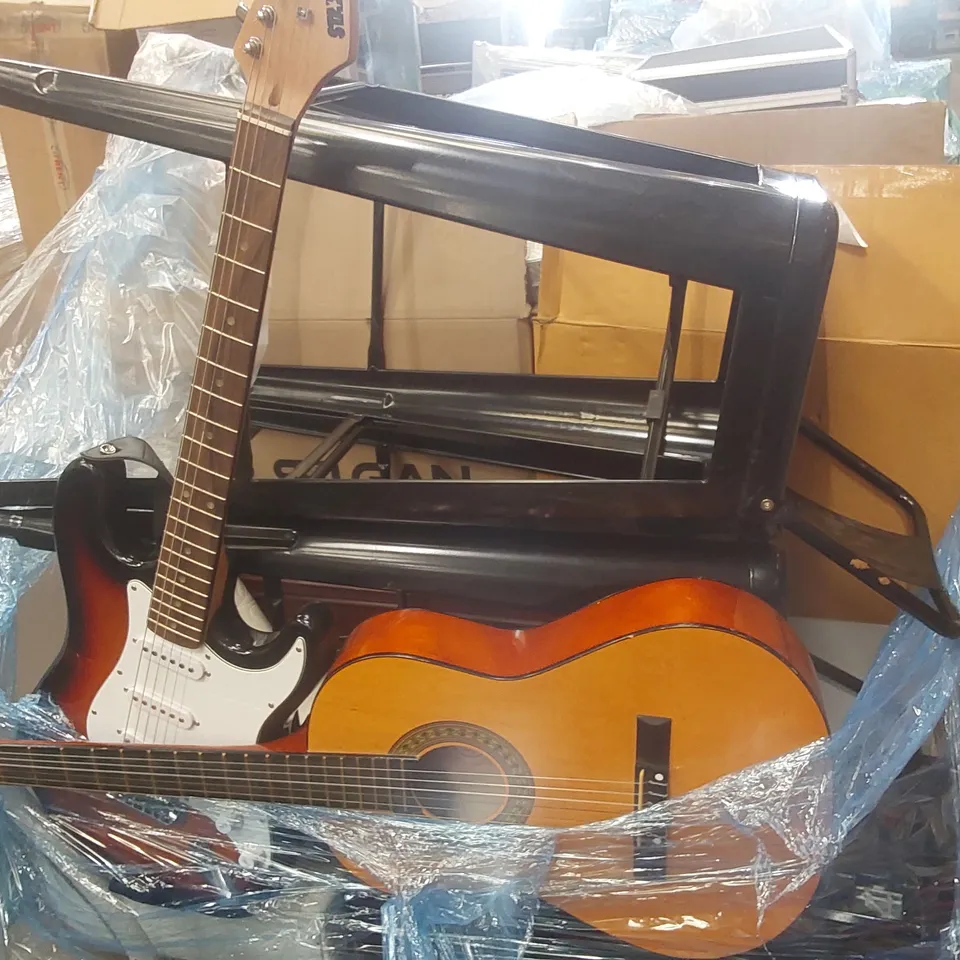 PALLET CONTAINING A VERY LARGE QUANTITY OF ASSORTED ITEMS INCLUDING: STARSOUND ELECTRIC GUITAR, ACOUSTIC GUITAR, FURNITURE, DINNERWARE ECT
