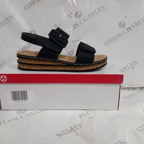 BOXED PAIR OF RIEKER WEDGE SANDALS IN BLACK SIZE 6