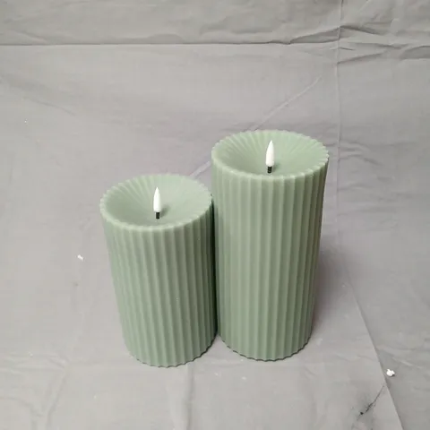 SET OF 2 GREEN FLUTED BATTERY POWERED OUTDOOR CANDLES
