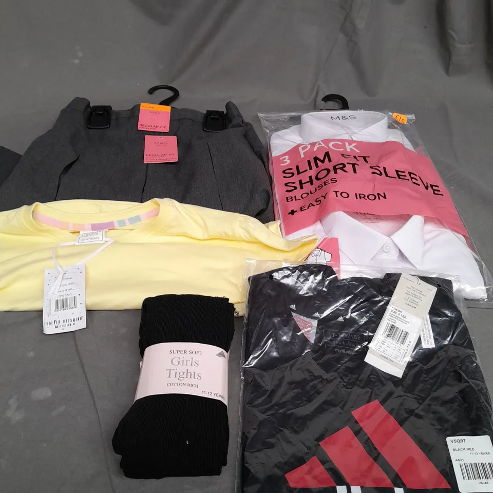 APPROXIMATELY 15 ASSORTED CHILDRENS CLOTHING PRODUCTS RANGING FROM AGES 10-15YRS