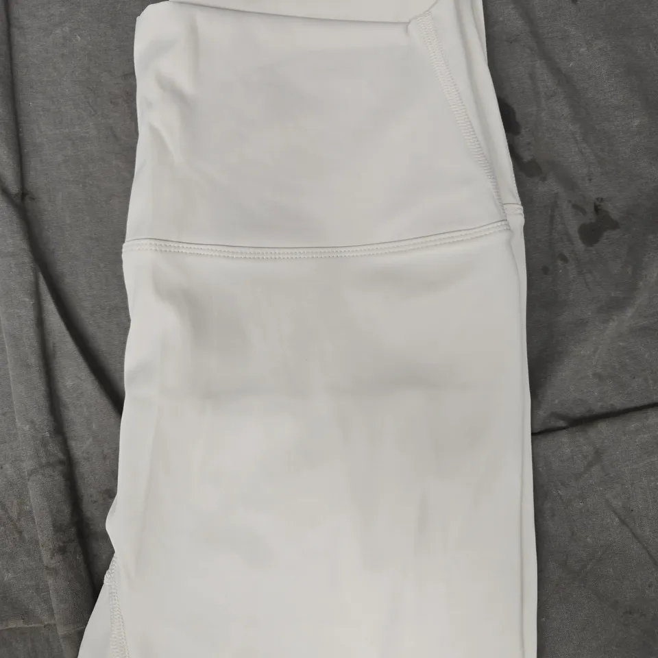 LULULEMON LEGGINGS IN CREAM SIZE 8