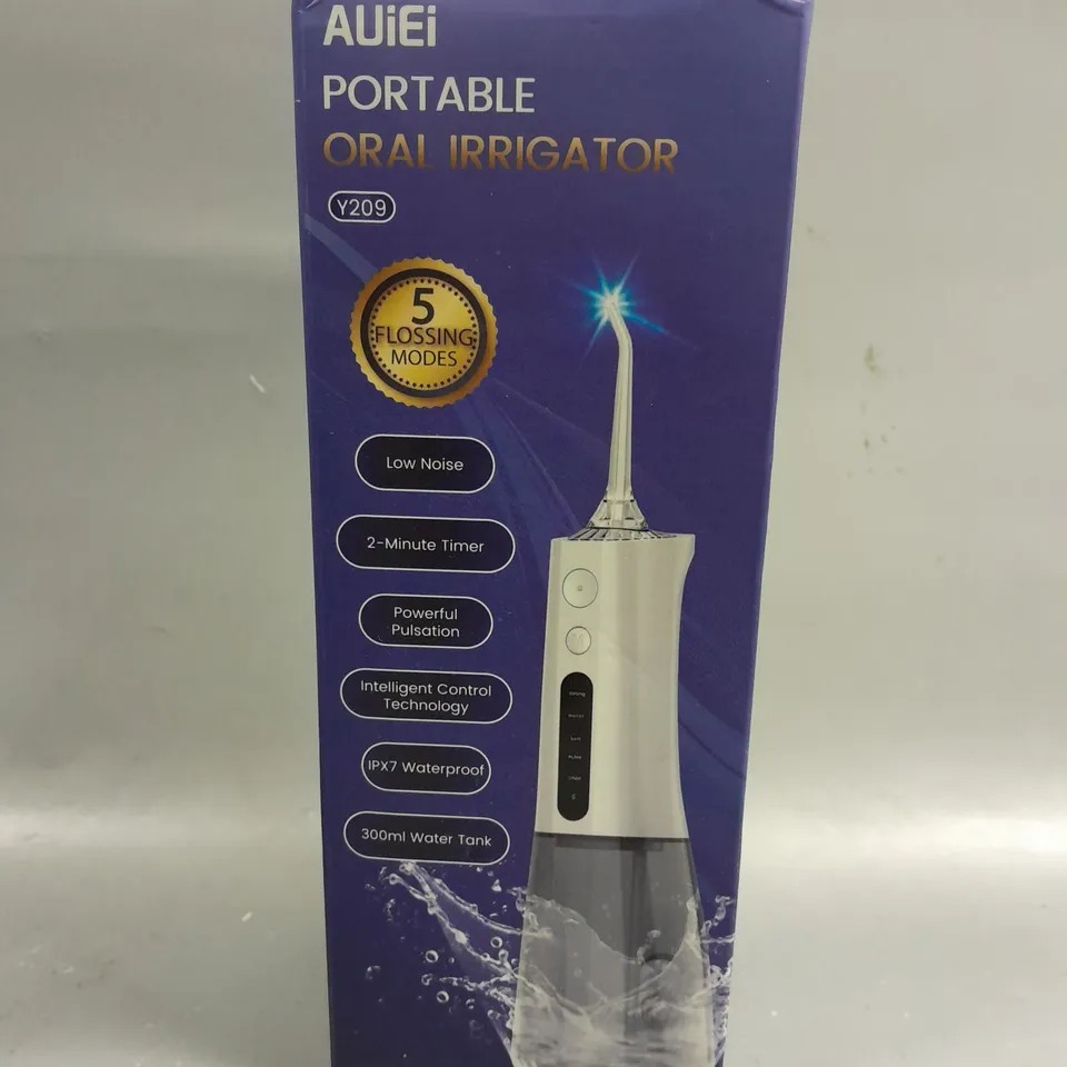 BOXED AUIEI PORTABLE ORAL IRRIGATOR IN WHITE 