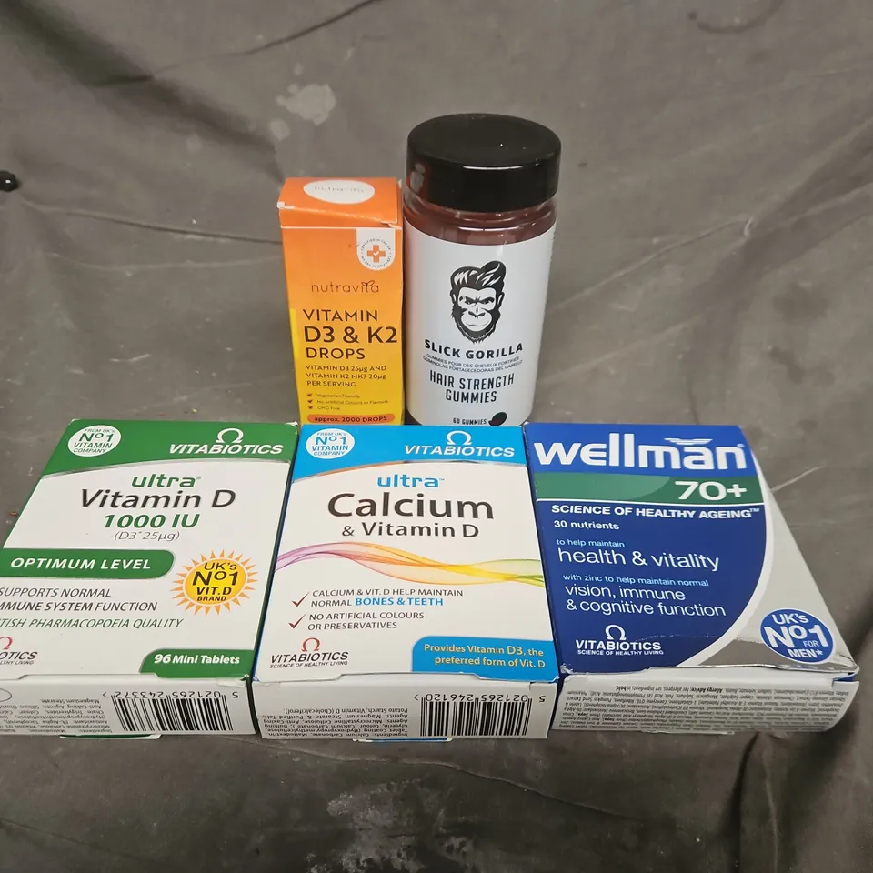 APPROX 10 ASSORTED ITEMS TO INCLUDE : VITABIOTICS ULTRA VITAMIN D 1000 IU, CALCIUM & VITAMIN D; WELLMAN 70+; NUTRAVITA D3 & K2 DROPS; SLICK GORILLA HAIR GUMMIES
