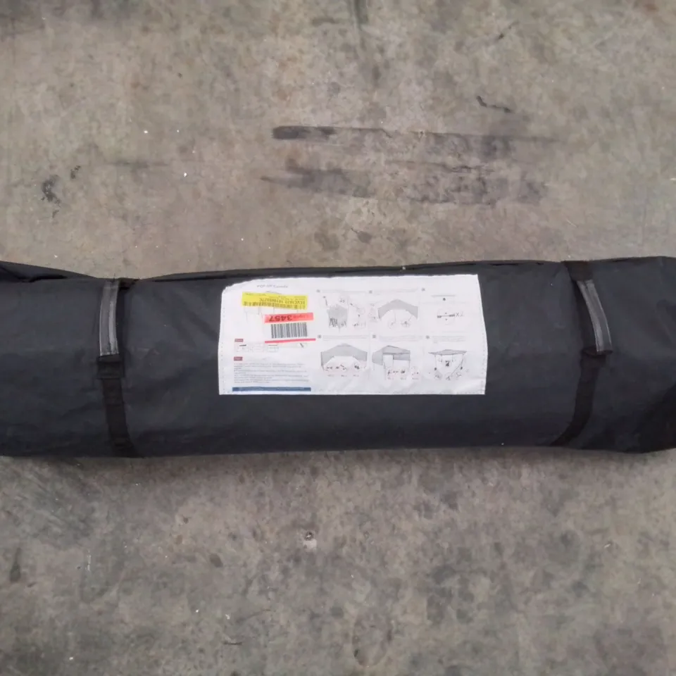 A BAGGED POP UP CANOPY/MARKEE