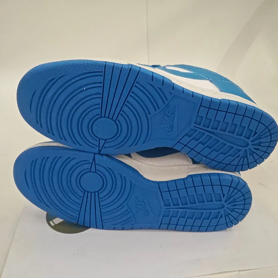 PAIR OF NIKE TRAINERS IN WHITE.BLUE - UK 5.5