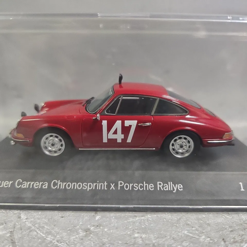TAG HEUER LIMITED EDITION CARRERA CHRONOSPRINT PORSCHE RALLYE WATCH AND MODEL CAR IN PRESENTATION BOX
