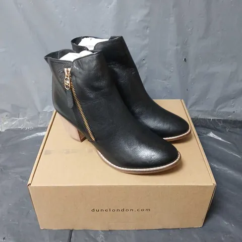 BOXED PAIR OF DUNE LONDON ZIP UP ANKLE BOOTS IN BLACK - SIZE 7