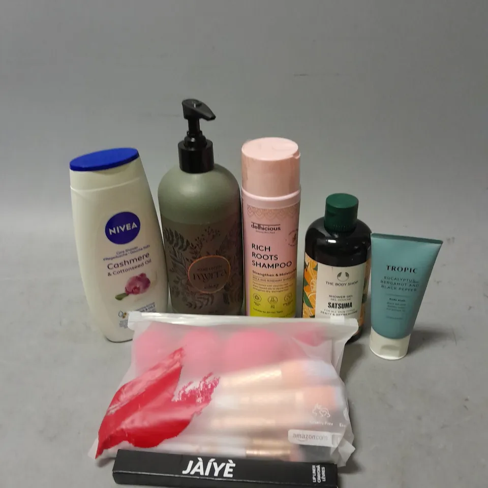 APPROXIMATELY 20 ASSORTED COSMETIC ITEMS TO INCLUDE - NIVEA CASHMERE AND COTTONSEED OIL BODY WASH - TROPIC BODY WASH - THE BODY SHOP SATSUMA SHOWER GEL