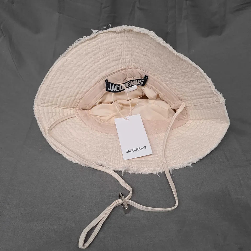 JACQUEMUS DISTRESSED EDGE DRAWSTRING BUCKET HAT IN BEIGE ONE SIZE