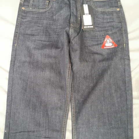 DUCK AND COVER STRAIGHT FIT JEANS IN DARK BLUE SIZE 32X34