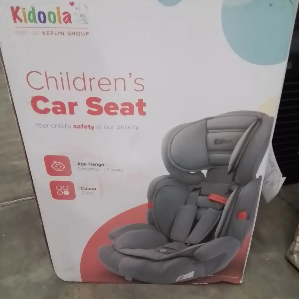BOXED KIDOOLA CHILDREN'S CAR SEAT