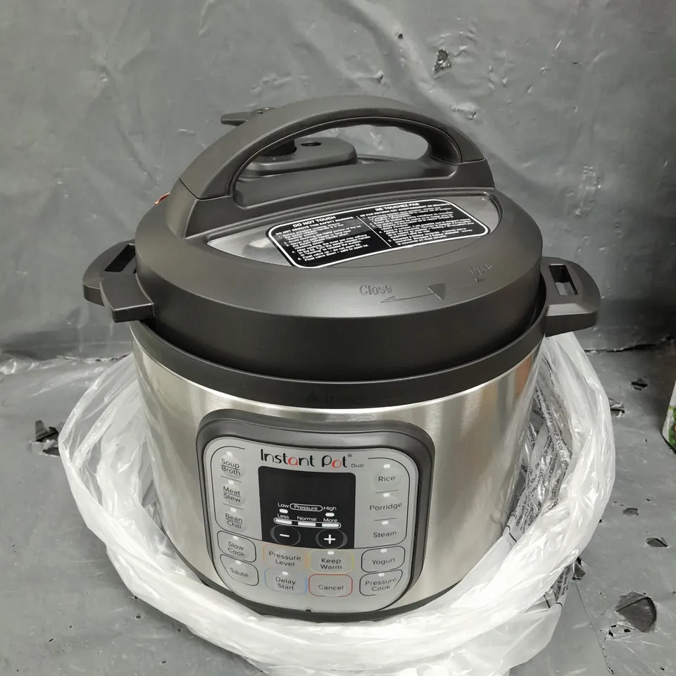 BOXED INSTANT POT DUO MULTI-USE PRESSURE COOKER