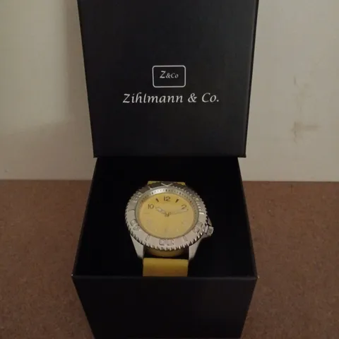ZIHLMANN & CO STAINLESS STEEL WATCH WITH YELLOW FACE & YELLOW RUBBER STRAP