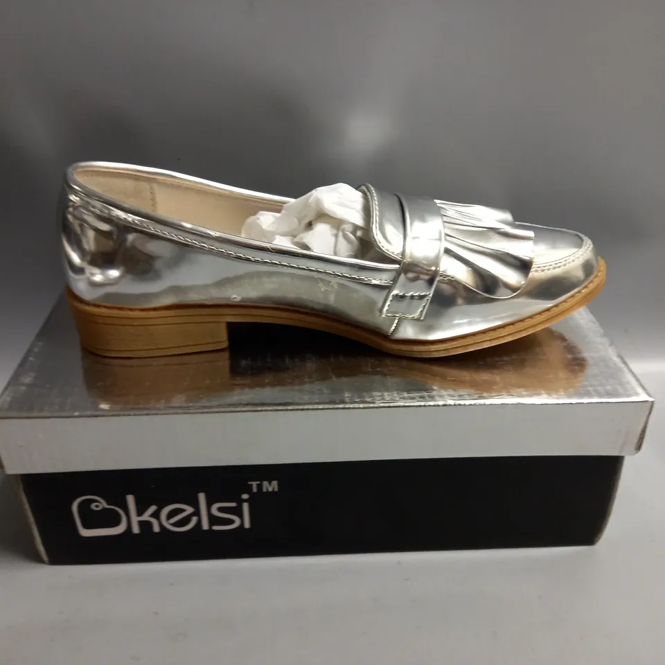 BOXED KELSI LADIES FLAT SILVER BROGUES. SIZE 5