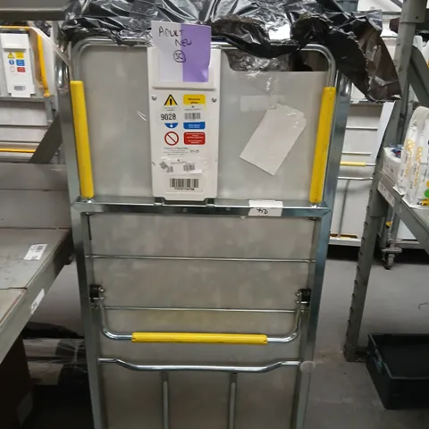 LARGE CAGE OF ASSORTED UNPROCESSED RAW RETURN DESIGNER CLOTHING