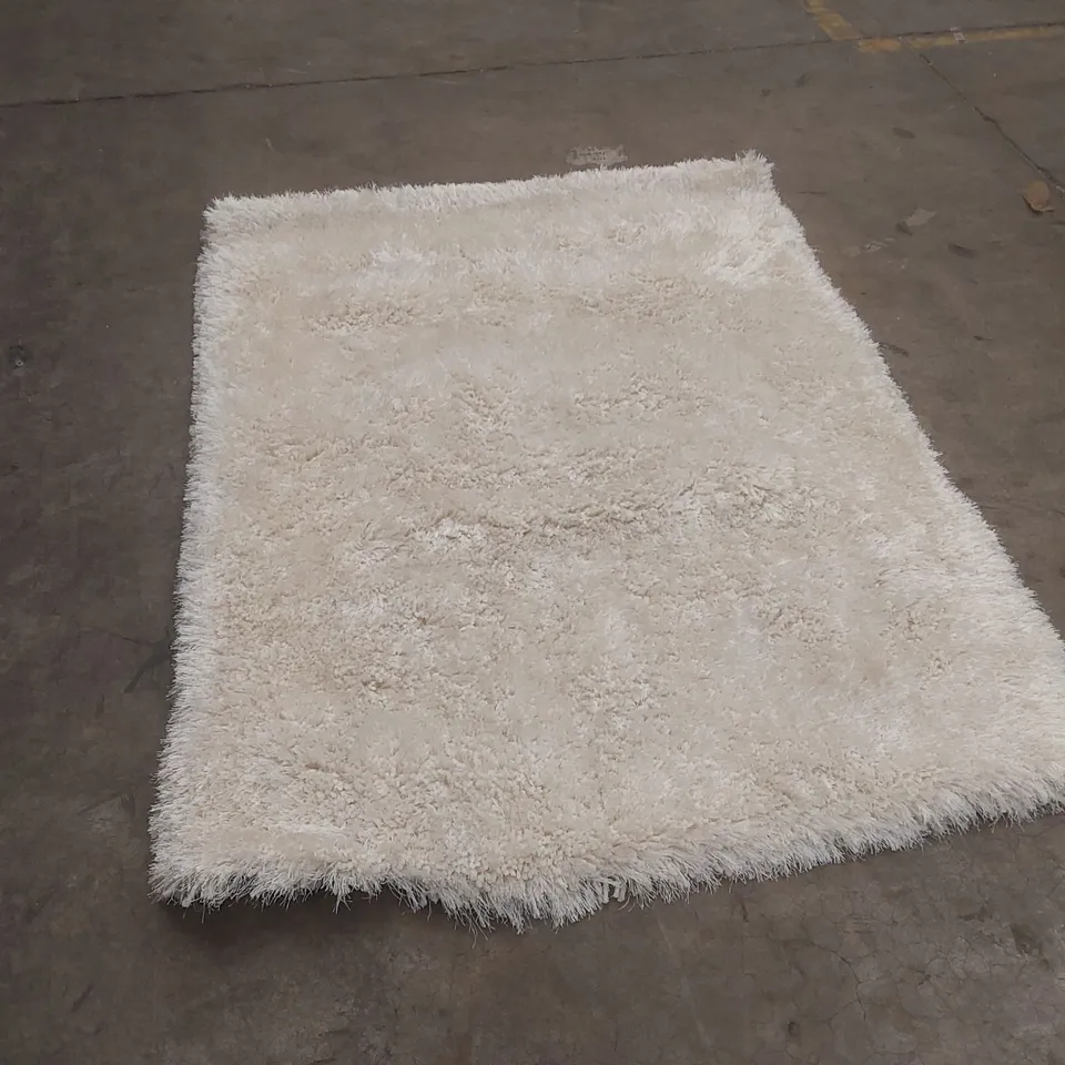 WHITE SHAGGY RUG - APPROXIMATELY 165 x 120cm