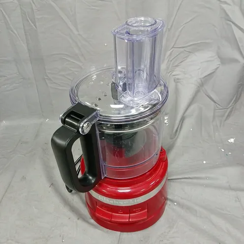 RED KITCHEN BLENDER WITH TRANSPARENT JUG AND TOP FEED ATTACHMENT . NOT TESTED