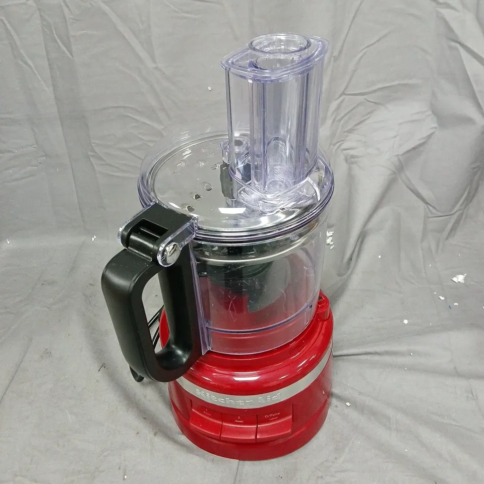 RED KITCHEN BLENDER WITH TRANSPARENT JUG AND TOP FEED ATTACHMENT . NOT TESTED