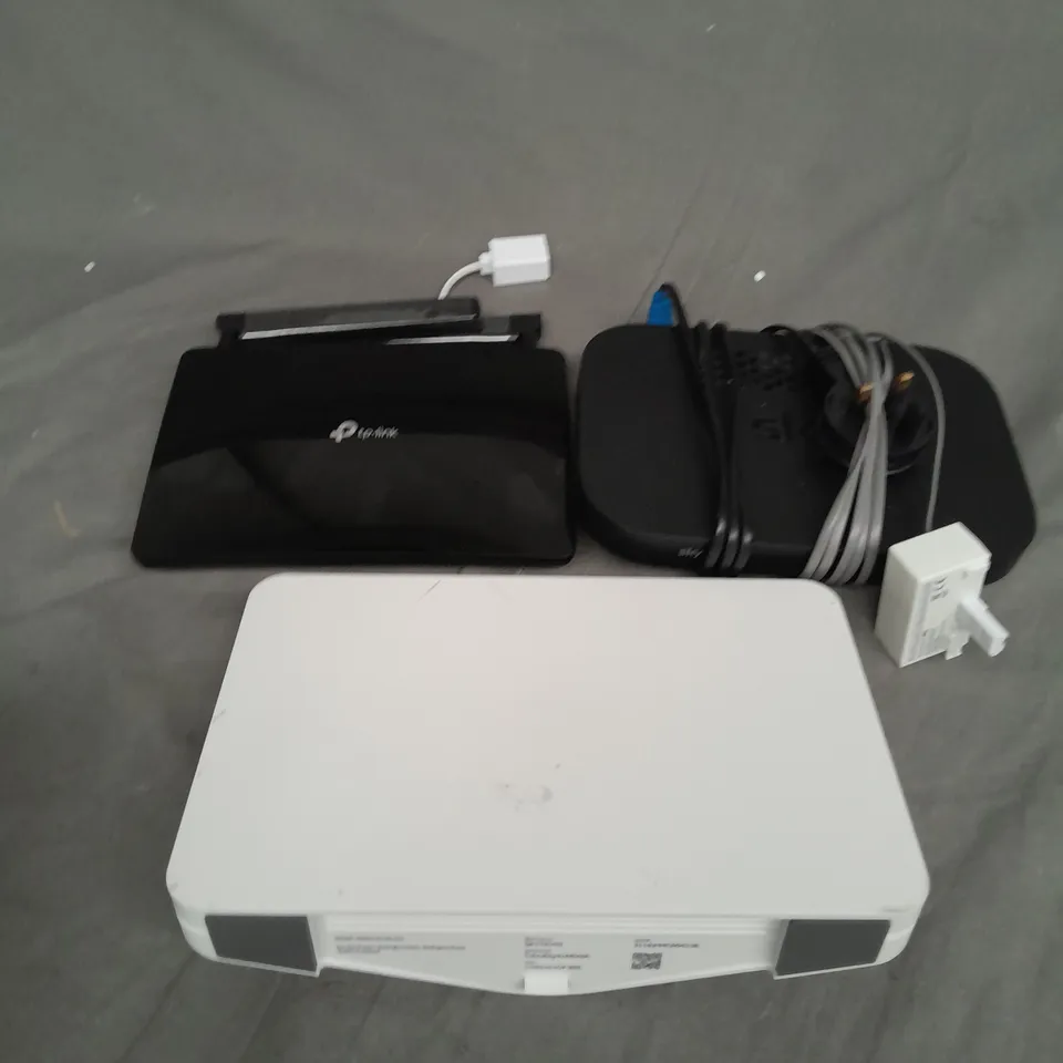 TOTE OF ASSORTED HOUSEHOLD ITEMS TO INCLUDE SKY BOXES AND TP-LINK BOX