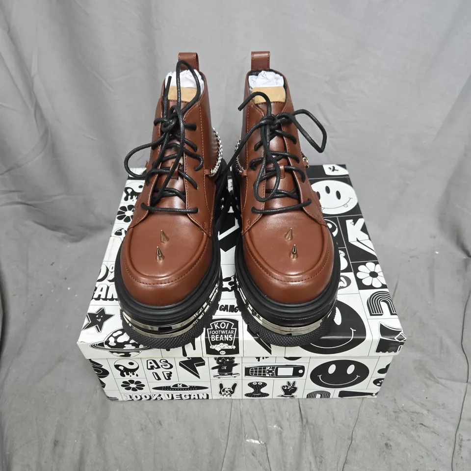BOXED PAIR OF KOI THE SILENCE PLATFORM GRUNGE BOOTS IN BROWN - UK 4