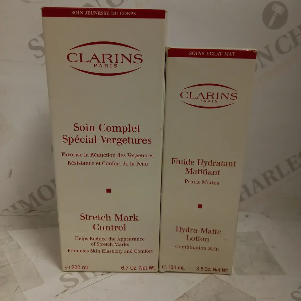 LOT OF 2 ASSORTED CLARINS PRODUCTS TO INCLUDE STRETCH MARK CONTROL 200ML & HYDRA-MATTE LOTION 100ML