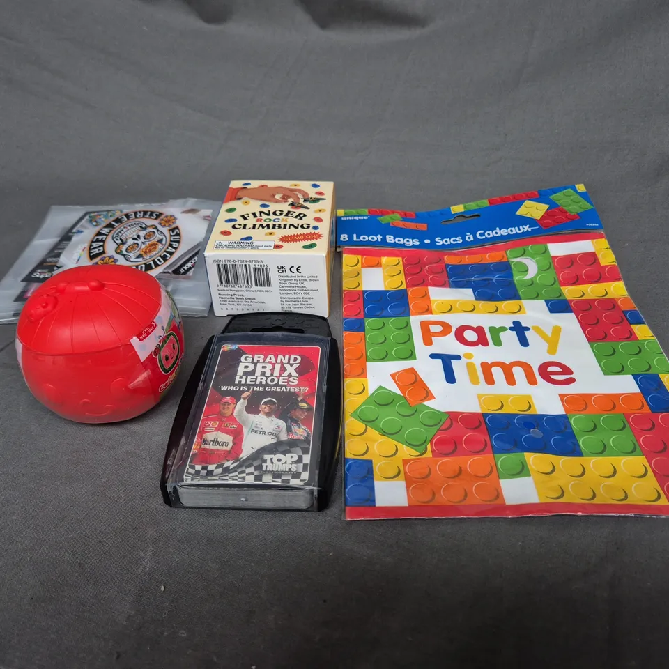 BOX OF ASSORTED TOYS AND GAMES TO INCLUDE TOP TRUMPS, FINGER ROCK CLIMBING AND COCOMELON