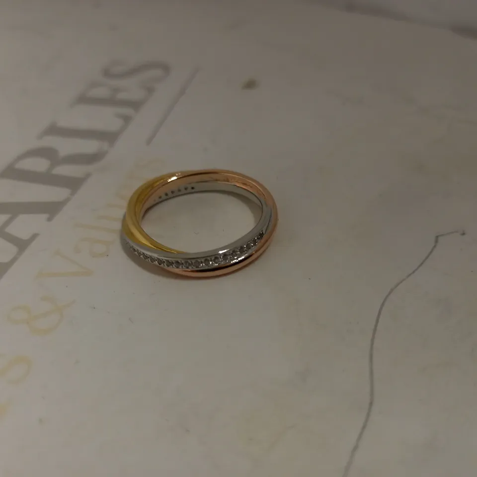 JEULIA SILVER AND GOLD EFFECT TWISTED BAND RING - SIZE Q1/2