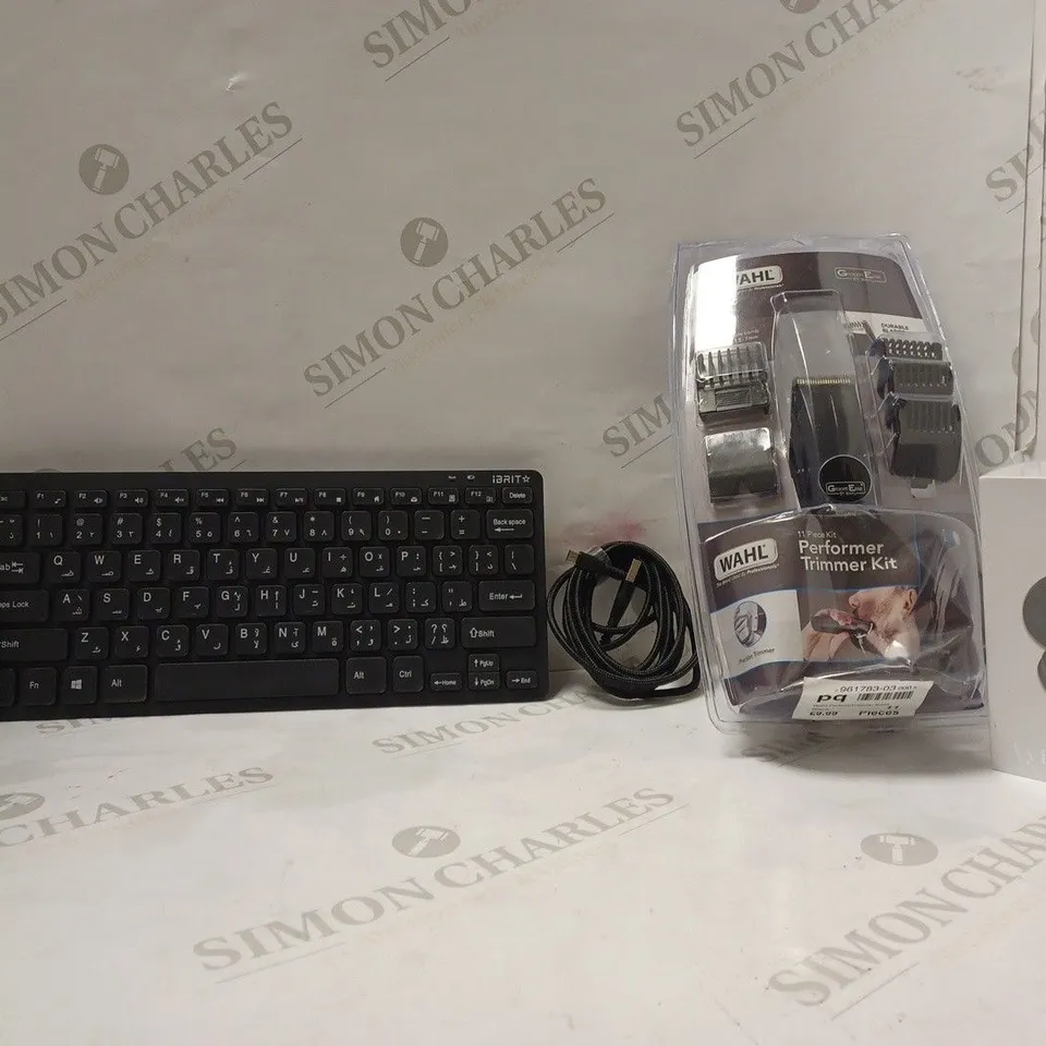 LOT OF APPROXIMATELY 7 ASSORTED ITEMS TO INCLUDE -WAHL PERFORMER TRIMMER KIT - TRUE WIRELESS STEREO EARBUDS - MIXX MICRO TO USB ECT