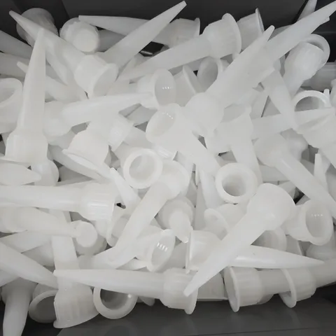 APPROXIMATELY 50 ADHESIVE CONE NOZZLE TIPS