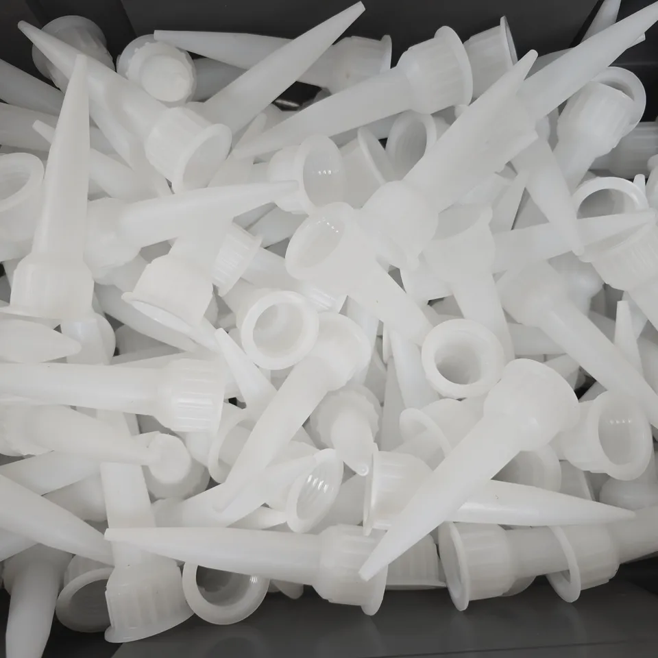 APPROXIMATELY 50 ADHESIVE CONE NOZZLE TIPS