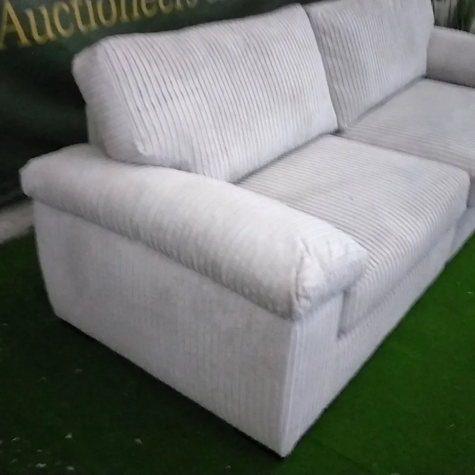 DESIGNER BEIGE CORDED FABRIC FOUR SEATER SOFA