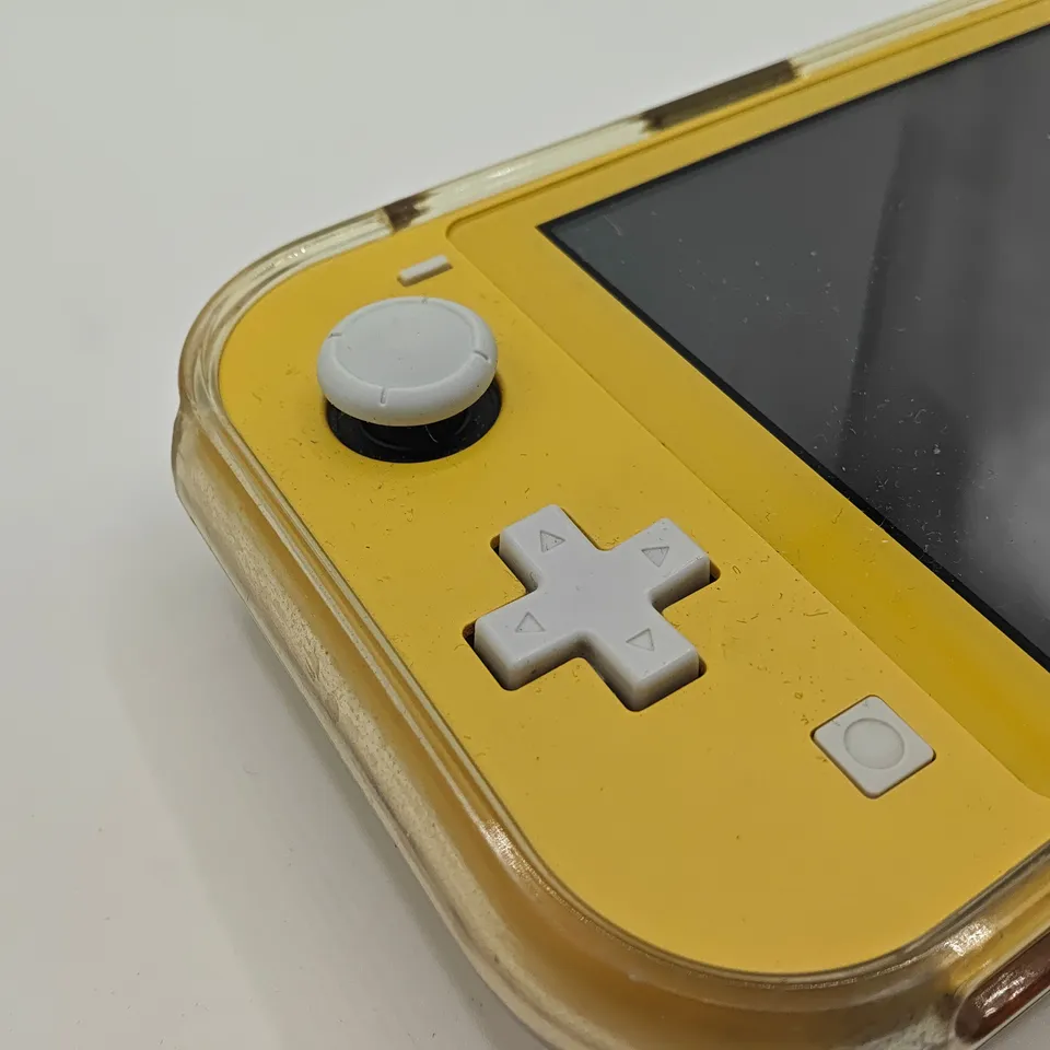 UNBOXED NINTENDO SWITCH LITE IN YELLOW WITH CLEAR CASE - HDH-001