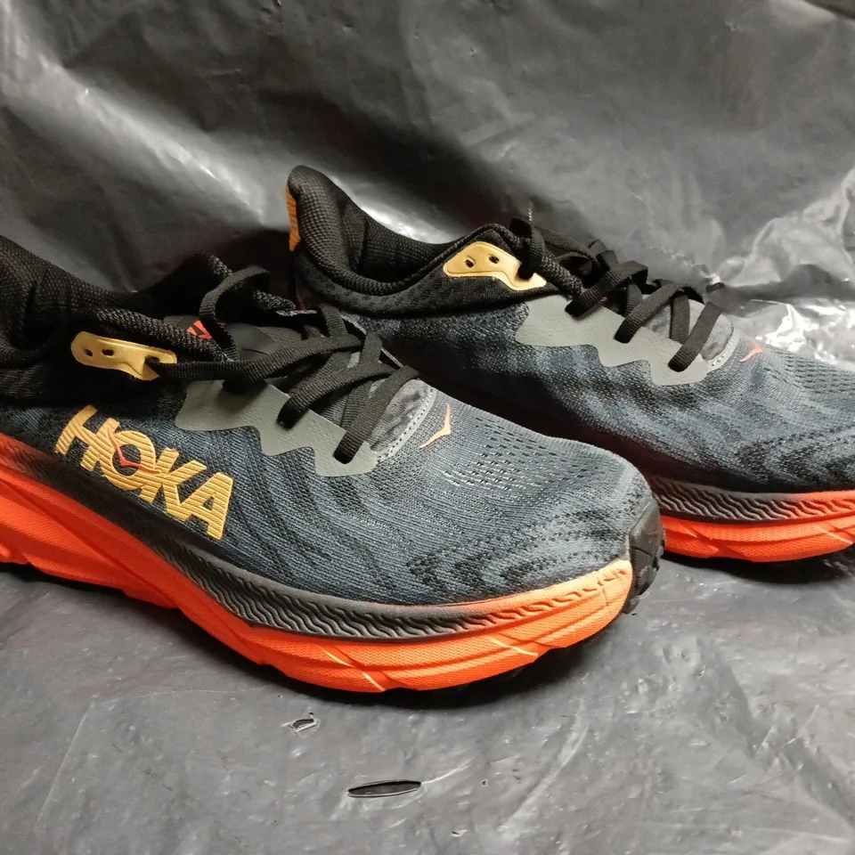 PAIR OF HOKA CHALLENGER ATR 7 TRAINERS IN GREY/ORANGE SIZE UK 10.5