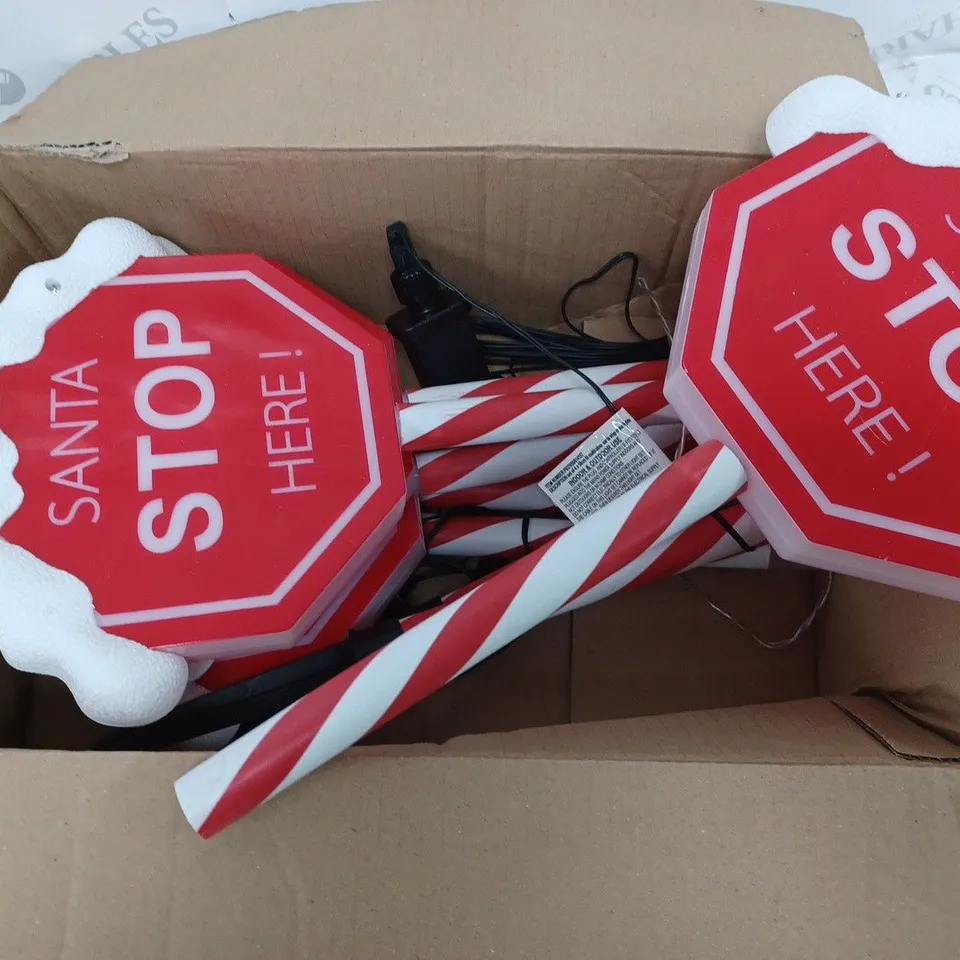 BOXED FESTIVE SET OF PRELIT SANTA STOP HERE STAKES