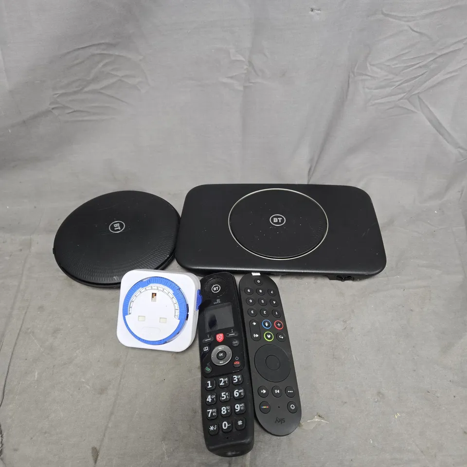 APPROXIMATELY 15 ASSORTED HOUSEHOLD ITEMS TO INCLUDE ROUTERS, REMOTE CONTROL, PHONE HAND SET, PLUG TIMER ETC