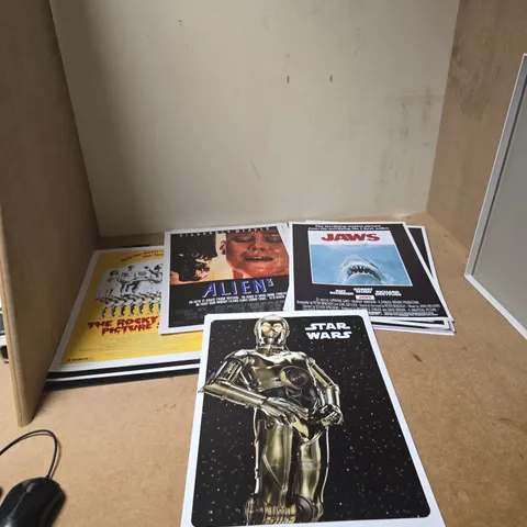 APPROXIMATELY 100 COLOURBYTE PHOTO PAPER PRINTS OF VARIOUS FILMS , MUSICALS AND ALBUMS INCLUDING JAWS , ALIEN 3 , THE ROCKY HORROR PICTURE SHOW AND STAR WARS 