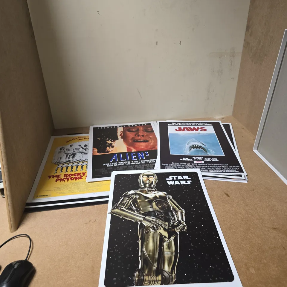 APPROXIMATELY 100 COLOURBYTE PHOTO PAPER PRINTS OF VARIOUS FILMS , MUSICALS AND ALBUMS INCLUDING JAWS , ALIEN 3 , THE ROCKY HORROR PICTURE SHOW AND STAR WARS 